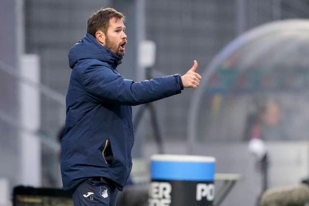 Thomas Johrden Coach, Interim Coach, TSG , with thumbs up, gesture, gesture, confident, positive, optimistic, joy, rejoice, rejoicing, single image, single photo, action, action, 23 11 2025, Sinsheim Hoffenheim Germany , Football, Google Pixel Women Bundesliga, TSG 1899 Hoffenheim FC Bayern Munich, DFB DFL REGULATIONS PROHIBIT ANY USE OF PHOTOGRAPHS AS IMAGE SEQUENCES AND OR QUASI VIDEO xozx