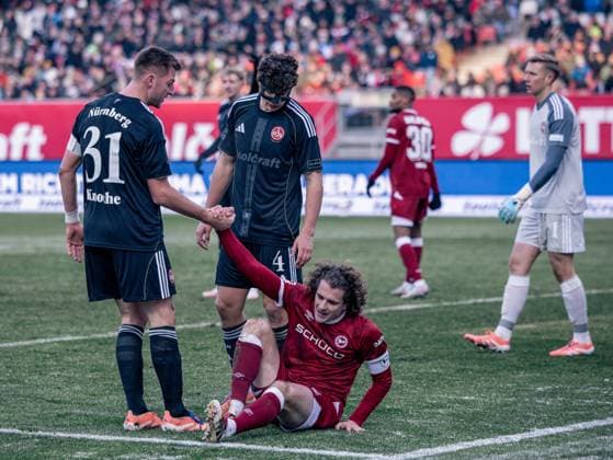 Germany Soccer, 2 Bundesliga 2025 26, 13 Matchday 1 FC Nuremberg vs Arminia Bielefeld Max Morlock Stadion Nuremberg Mohamed Ali Zoma 1 FC Nuremberg, 23 Maël Corboz Arminia Bielefeld, 6 Copyright: xChristopherxRupprechtx