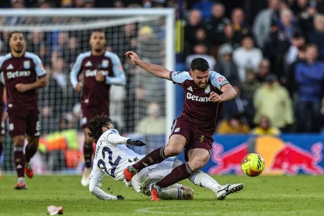 Premier League Leeds United v Aston Villa John McGinn of Aston Villa is tackled by Ao Tanaka of Leeds United during the Premier League match Leeds United vs Aston Villa at Elland Road, Leeds, United Kingdom, 23rd November 2025 (Photo by Alfie Cosgrove News Images) Leeds Elland Road West Yorkshire United Kingdom Copyright: xAlfiexCosgrove NewsxImagesx