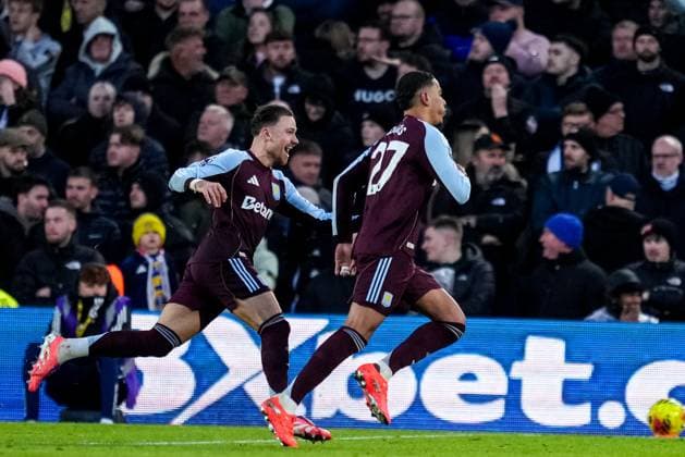 LEEDS, ENGLAND - NOVEMBER 23: Matty Cash of Aston Villa and Morgan Rogers of Aston Villa celebrate their team s second goal during the Premier League match between Leeds United and Aston Villa at Elland Road on November 23, 2025 in Leeds, England. (Photo by Rene Nijhuis) SPO  Copyright: xRenexNijhuis