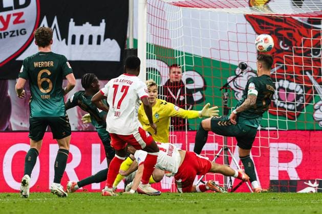 Goalkeeper Mio Backhaus Werder Bremen,30 vs Christoph Baumgartner RB Leipzig,14 1 Soccer Bundesliga Season 2025 2026 Point Match RB Leipzig vs Werder Bremen at the Red Bull Arena in Leipzig Action,Soccer,Germany,Man,Men,23 11 2025