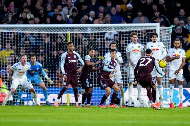 LEEDS, ENGLAND - NOVEMBER 23: Morgan Rogers of Aston Villa shoots to score his team s second goal during the Premier League match between Leeds United and Aston Villa at Elland Road on November 23, 2025 in Leeds, England. (Photo by Rene Nijhuis) SPO  Copyright: xRenexNijhuis