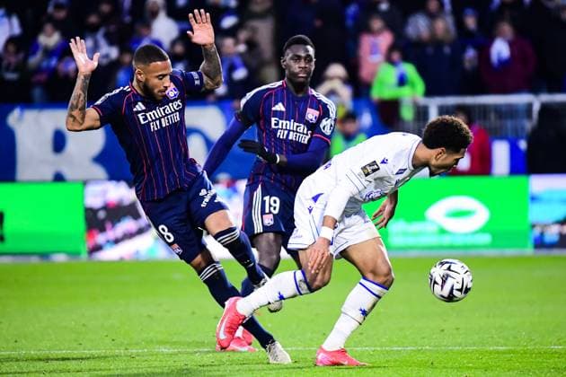 FOOTBALL : AJ Auxerre vs OL - Ligue 1 McDonalds - JournÃ e 13 - 23 11 2025 Corentin Tolisso (OL) Danny Namaso (AJ Auxerre) Moussa NiakhatÃ (OL) AuxerreFrance  Copyright: xBaptistexAutissierx