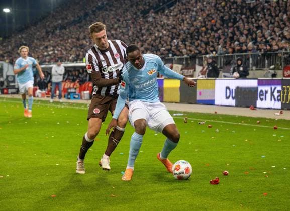 Soccer, Men, Season 2025 2026, 1 Bundesliga 11 Matchday , FC St Pauli 1 FC Union Berlin, v l Hauke Wahl St Pauli , Ilyas Ansah 1 FC Union Berlin , 23 11 2025, Copyright: xMatthiasxKochx