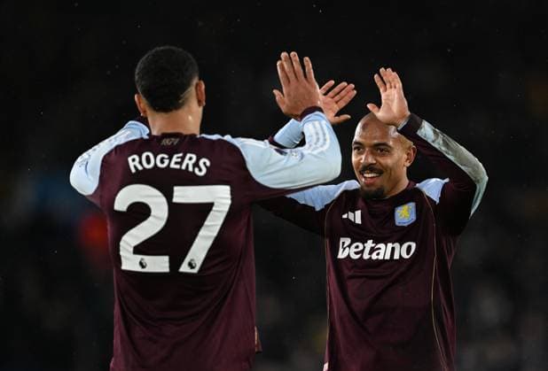 Morgan Rogers and Donyell Malen of Aston Villa celebrate at full time Leeds United v Aston Villa, Premier League, Football, Elland Road, Leeds, UK - 23 Nov 2025Leeds Elland Road United Kingdom EDITORIAL USE ONLY No use with unauthorised audio, video, data, fixture lists, club league logos or live services. Online in-match use limited to 120 images, no video emulation. No use in betting, games or single club league player publications. Copyright: xAnnaxGowthorpe Shutterstockx 15860945bh