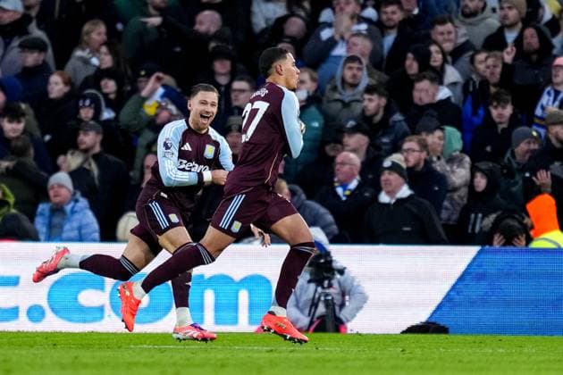 LEEDS, ENGLAND - NOVEMBER 23: Matty Cash of Aston Villa and Morgan Rogers of Aston Villa celebrate their team s second goal during the Premier League match between Leeds United and Aston Villa at Elland Road on November 23, 2025 in Leeds, England. (Photo by Rene Nijhuis) SPO  Copyright: xRenexNijhuis