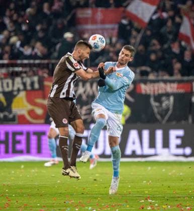 Soccer, Men, Season 2025 2026, 1 Bundesliga 11 Matchday , FC St Pauli 1 FC Union Berlin, v l Karol Mets St Pauli , Andrej Ilic 1 FC Union Berlin , 23 11 2025, Copyright: xMatthiasxKochx