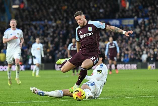 Ross Barkley of Aston Villa is fouled by Pascal Struijk of Leeds United resulting in a free kick leading to Aston Villa s second goal Leeds United v Aston Villa, Premier League, Football, Elland Road, Leeds, UK - 23 Nov 2025Leeds Elland Road United Kingdom EDITORIAL USE ONLY No use with unauthorised audio, video, data, fixture lists, club league logos or live services. Online in-match use limited to 120 images, no video emulation. No use in betting, games or single club league player publications. Copyright: xAnnaxGowthorpe Shutterstockx 15860945br