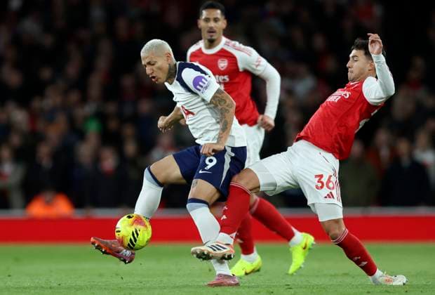Arsenal v Tottenham Hotspur - Premier League Richarlison of Tottenham Hotspur and Martin Zubimendi of Arsenal challenge during the Premier League match between Arsenal and Tottenham Hotspur at Emirates Stadium on November 23, 2025 in London, England. London Emirates Stadium England United Kingdom Copyright: xNigelxFrench Sportsphoto APLx 14142470