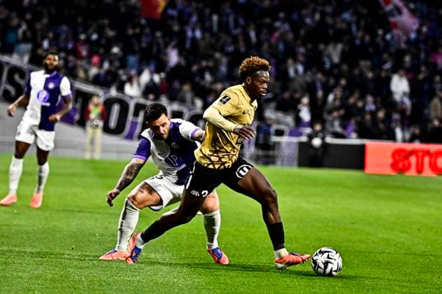 FOOTBALL : Toulouse vs Angers - 13eme Journee de Ligue 1 McDonald S - Toulouse - 23 11 2025 Jacquzs Ekomie (sco) vs Aron Donnum (tfc) Toulouse  Copyright: xThierryxBretonx