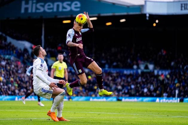 LEEDS, ENGLAND - NOVEMBER 23: Lucas Digne of Aston Villa heads the ball during the Premier League match between Leeds United and Aston Villa at Elland Road on November 23, 2025 in Leeds, England. (Photo by Rene Nijhuis) SPO  Copyright: xRenexNijhuis