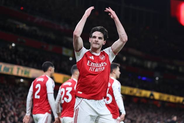 London, England, 23rd November 2025. Declan Rice of Arsenal celebrates after team mate Eberechi Eze (not pictured) scores to make it 2-0 during the Arsenal vs Tottenham Hotspur Premier League match at the Emirates Stadium, London. Picture credit should read: David Klein Sportimage EDITORIAL USE ONLY. No use with unauthorised audio, video, data, fixture lists, club league logos or live services. Online in-match use limited to 120 images, no video emulation. No use in betting, games or single club league player publications. SPI_085_DK_Arsenal_Tottenham SPI-4307-0084