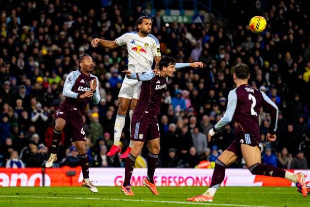 LEEDS, ENGLAND - NOVEMBER 23: Pau Torres of Aston Villa heads wins a defensive header from Dominic Calvert-Lewin of Leeds United during the Premier League match between Leeds United and Aston Villa at Elland Road on November 23, 2025 in Leeds, England. (Photo by Rene Nijhuis) SPO  Copyright: xRenexNijhuis