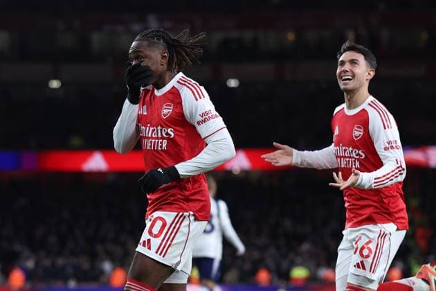 London, England, 23rd November 2025. Eberechi Eze (L) of Arsenal celebrates after scoring to make it 3-0 during the Arsenal vs Tottenham Hotspur Premier League match at the Emirates Stadium, London. Picture credit should read: David Klein Sportimage EDITORIAL USE ONLY. No use with unauthorised audio, video, data, fixture lists, club league logos or live services. Online in-match use limited to 120 images, no video emulation. No use in betting, games or single club league player publications. SPI_091_DK_Arsenal_Tottenham SPI-4307-0090