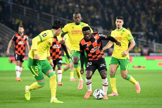 FC Nantes v FC Lorient - Ligue 1 McDonald s 2025 2026 15 Aiyegun TOSIN (fcl) - 80 Junior MWANGA (fcn) during the Ligue 1 McDonald s match between Nantes and Lorient at Stade de la Beaujoire on November 23, 2025 in Nantes, France. Nantes France  Copyright: xFEPx 776348203