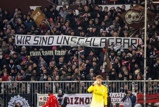 Soccer, Men, Season 2025 2026, 1 Bundesliga 11 Matchday , FC St Pauli 1 FC Union Berlin, Fans of St Pauli with banner Wir sind unschlagbar , 23 11 2025, Copyright: xMatthiasxKochx