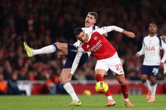 Mikel Merino of Arsenal and Micky van de Ven of Tottenham Hotspur - Arsenal v Tottenham Hotspur, Premier League, Emirates Stadium, London, UK - 23rd November 2025 Editorial Use Only - DataCo restrictions apply Arsenal v Tottenham Hotspur, Premier League, Football, Emirates Stadium, London, UK - 23 Nov 2025London Emirates Stadium United Kingdom EDITORIAL USE ONLY No use with unauthorised audio, video, data, fixture lists, club league logos or live services. Online in-match use limited to 120 images, no video emulation. No use in betting, games or single club league player publications.  Copyright: xMDI Shutterstockx 15874294z