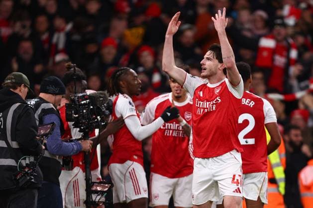 Declan Rice of Arsenal celebrates his sides second goal scorer by Eberechi Eze of Arsenal - Arsenal v Tottenham Hotspur, Premier League, Emirates Stadium, London, UK - 23rd November 2025 Editorial Use Only - DataCo restrictions apply Arsenal v Tottenham Hotspur, Premier League, Football, Emirates Stadium, London, UK - 23 Nov 2025London Emirates Stadium United Kingdom EDITORIAL USE ONLY No use with unauthorised audio, video, data, fixture lists, club league logos or live services. Online in-match use limited to 120 images, no video emulation. No use in betting, games or single club league player publications.  Copyright: xMDI Shutterstockx 15874294w