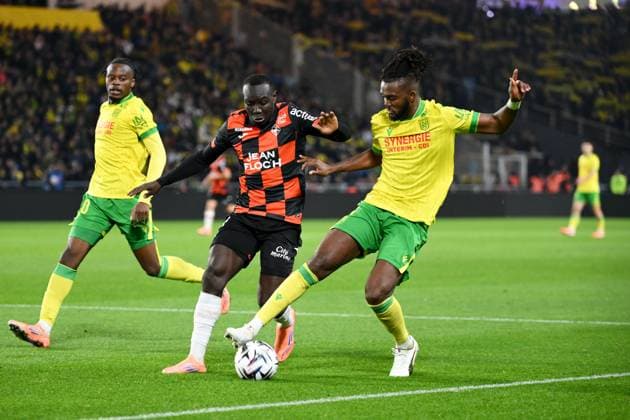 FC Nantes v FC Lorient - Ligue 1 McDonald s 2025 2026 09 Mohamed BAMBA (fcl) - 06 Chidozie AWAZIEM (fcn) during the Ligue 1 McDonald s match between Nantes and Lorient at Stade de la Beaujoire on November 23, 2025 in Nantes, France. Nantes France  Copyright: xFEPx 776348203