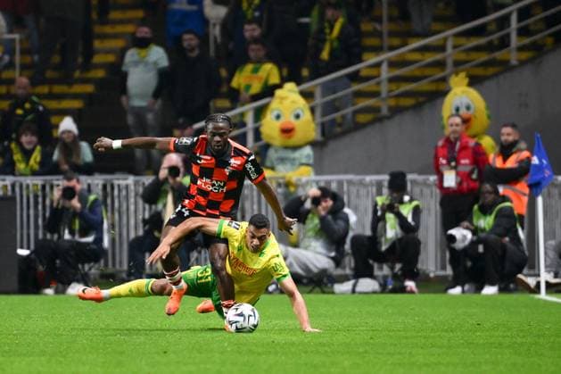 FC Nantes v FC Lorient - Ligue 1 McDonald s 2025 2026 44 Darlin YONGWA (fcl) - 31 Mostafa MOHAMED (fcn) during the Ligue 1 McDonald s match between Nantes and Lorient at Stade de la Beaujoire on November 23, 2025 in Nantes, France. Nantes France  Copyright: xFEPx 776348203