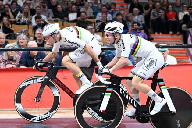 Belgian Lindsay De Vylder and Belgian Fabio Van Den Bossche pictured in action during the last day of the Zesdaagse Vlaanderen-Gent six-day indoor Track cycling, Rad, Radsport, Bahnrad, Bahn event at the indoor cycling arena t Kuipke, Sunday 23 November 2025, in Gent. MAARTENxSTRAETEMANS  x143668089x