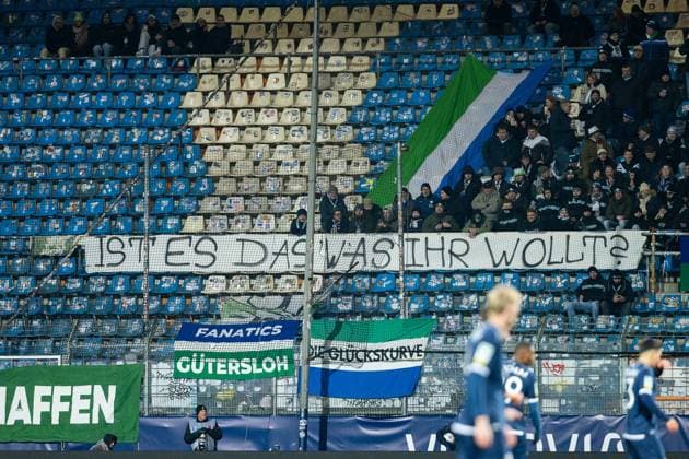 23 11 2025, xkwix, Football, Regionalliga West, VfL Bochum 1848 U21 FC Gütersloh, Vonovia Ruhrstadion fan protest banner of Gütersloh fans NRW Germany
