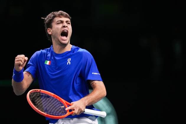 Flavio Cobolli celebrates after winning the set during Davis Cup Finals 2025 finals match between Flavio Cobolli (Italy) and Jaume Munar (Spain) at Bologna Fiere, Bologna, Italy - November 23, 2025. - Tennis.  Copyright: xMassimoxPaolone LaPressex