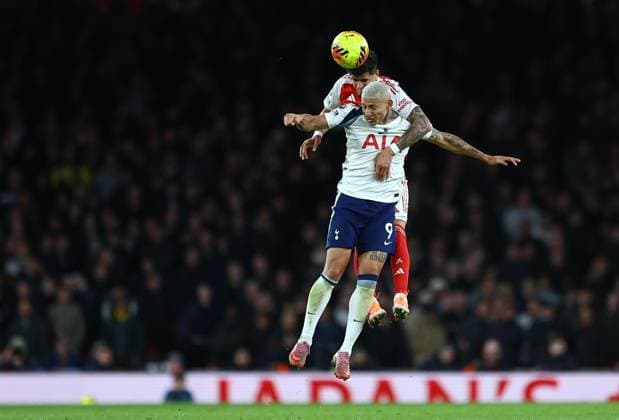 Richarlison of Tottenham Hotspur competes for the ball with Piero Hincapie of Arsenal Arsenal v Tottenham Hotspur, Premier League, Football, Emirates Stadium, London, UK - 23 Nov 2025London Emirates Stadium United Kingdom EDITORIAL USE ONLY No use with unauthorised audio, video, data, fixture lists, club league logos or live services. Online in-match use limited to 120 images, no video emulation. No use in betting, games or single club league player publications.  Copyright: xMichaelxZemanek Shutterstockx 15860967ay