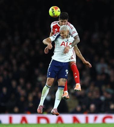 Richarlison of Tottenham Hotspur competes for the ball with Piero Hincapie of Arsenal Arsenal v Tottenham Hotspur, Premier League, Football, Emirates Stadium, London, UK - 23 Nov 2025London Emirates Stadium United Kingdom EDITORIAL USE ONLY No use with unauthorised audio, video, data, fixture lists, club league logos or live services. Online in-match use limited to 120 images, no video emulation. No use in betting, games or single club league player publications.  Copyright: xMichaelxZemanek Shutterstockx 15860967az