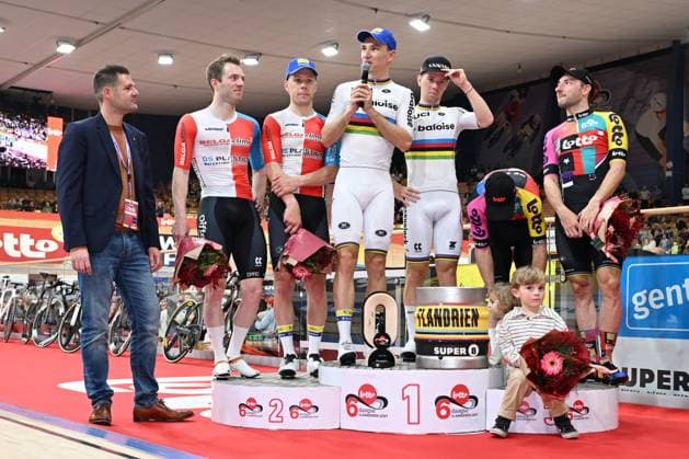 Dutch Yoeri Havik , Belgian Helene Hesters, Belgian Lindsay De Vylder, Belgian Fabio Van Den Bossche, Belgian Jasper De Buyst and Italian Elia Viviani pictured on the podium after the last day of the Zesdaagse Vlaanderen-Gent six-day indoor Track cycling, Rad, Radsport, Bahnrad, Bahn event at the indoor cycling arena t Kuipke, Sunday 23 November 2025, in Gent. MAARTENxSTRAETEMANS x143685297x