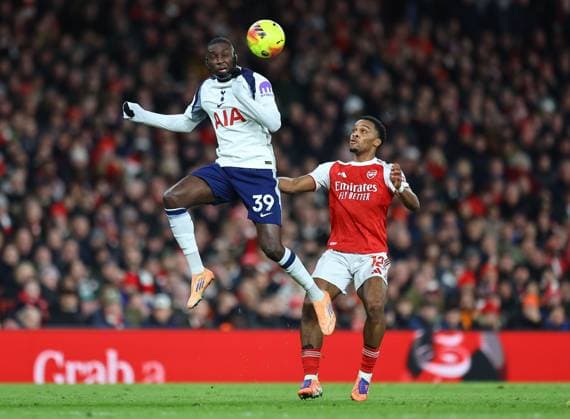 Randal Kolo Muani of Tottenham Hotspur and Jurrien Timber of Arsenal Arsenal v Tottenham Hotspur, Premier League, Football, Emirates Stadium, London, UK - 23 Nov 2025London Emirates Stadium United Kingdom EDITORIAL USE ONLY No use with unauthorised audio, video, data, fixture lists, club league logos or live services. Online in-match use limited to 120 images, no video emulation. No use in betting, games or single club league player publications.  Copyright: xMichaelxZemanek Shutterstockx 15860967be