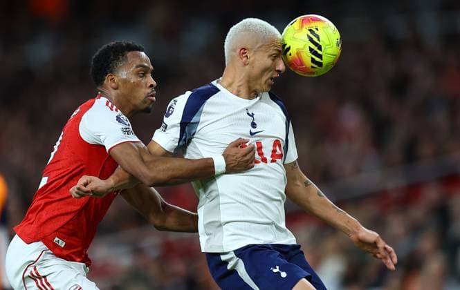Richarlison of Tottenham Hotspur and Jurrien Timber of Arsenal Arsenal v Tottenham Hotspur, Premier League, Football, Emirates Stadium, London, UK - 23 Nov 2025London Emirates Stadium United Kingdom EDITORIAL USE ONLY No use with unauthorised audio, video, data, fixture lists, club league logos or live services. Online in-match use limited to 120 images, no video emulation. No use in betting, games or single club league player publications.  Copyright: xMichaelxZemanek Shutterstockx 15860967bo