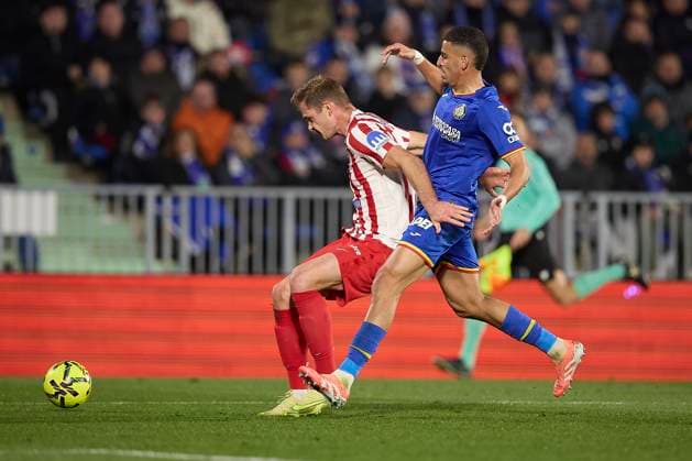 Alexander Sorloth Atletico de Madrid and Abdel Abra Getafe CF battle for the ball during the LaLiga EA Sports match between Getafe CF v AtlÃ tico Madrid at Coliseum on November 23, 2025 in Getafe, Spain Photo by Manu Reino DeFodi Images