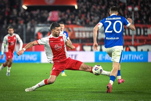 Germany, Football, 3 Liga, Matchday 15, 2025 2026, Rot Weiss Essen vs FC Energie Cottbus, 23 11 2025, Stadion an der Hafenstrasse, Essen, Germany, duel Klaus Gjasula Rot Weiss Essen, 8 vs Axel Borgmann Energie Cottbus, 20 Copyright: xMarkusxVerwimpx