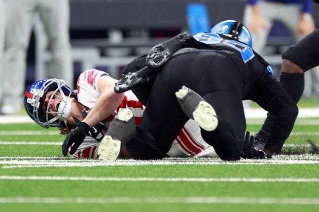 New York Giants vs Detroit Lions DETROIT,MICHIGAN-November23: Wide receiver Gunner Olszewski (80) of the New York Giants is tackled by defensive end Tyrus Wheat (99) of the Detroit Lions during an NFL, American Football Herren, USA football game between the New York Giants and the Detroit Lions in Detroit, Michigan USA, on Sunday, November 23, 2025. Detroit Michigan United States  Copyright: xAmyxLemusx originalFilename:lemus-newyorkg251123_npKeH.jpg