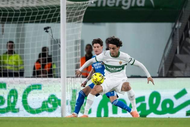 November 23, 2025, Elche, Alicante, SPAIN: Hector Fort of Elche CF and Fran Garcia of Real Madrid CF in action during the Spanish league, La Liga EA Sports, football match played between Elche CF and Real Madrid C.F. at Manuel Martinez Valero Stadium on November 23, 2025 in Elche, Spain. Elche SPAIN - ZUMAa181 20251123_zaa_a181_285 Copyright: xFranciscoxMaciax