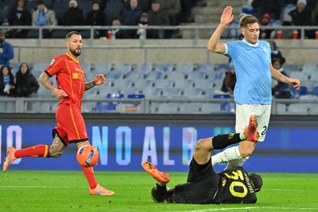 Soccer, serie A Enilive match, SS Lazio v Lecce Wladimiro Falcone of Lecce,Toma Basic of SS Lazio during the serie A Enilive match between SS Lazio v Lecce at olimpico stadium in Rome November 23rd, 2025 Imago-Images Emmefoto Copyright: xImago-Images Emmefotox
