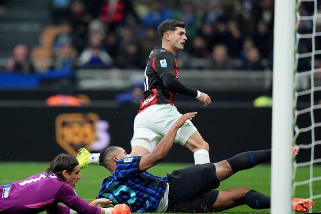 AC Milan s Christian Pulisic celebrates after scoring 0-1 during the Serie A soccer match between Inter and Milan at the San Siro Stadium in Milan , north Italy - Sunday , November 23 , 2025. - Soccer .  Copyright: xSpada LaPressex