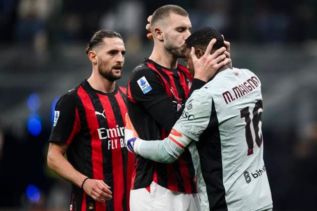 FC Internazionale v AC Milan - Serie A Mike Maignan of AC Milan celebrate with Strahinja Pavlovic of AC Milan and Adrien Rabiot of AC Milan after saving a penalty kick during the Serie A football match between FC Internazionale and AC Milan. Milan Italy Copyright: xNicolòxCampox