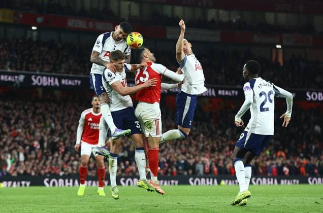 Mikel Merino of Arsenal competes for the ball with Cristian Romero of Tottenham Hotspur ,Joao Palhinha of Tottenham Hotspur and Richarlison of Tottenham Hotspur Arsenal v Tottenham Hotspur, Premier League, Football, Emirates Stadium, London, UK - 23 Nov 2025London Emirates Stadium United Kingdom EDITORIAL USE ONLY No use with unauthorised audio, video, data, fixture lists, club league logos or live services. Online in-match use limited to 120 images, no video emulation. No use in betting, games or single club league player publications.  Copyright: xMichaelxZemanek Shutterstockx 15860967bq