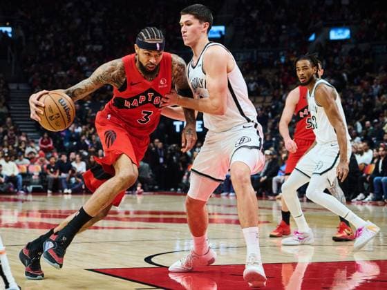 November 23, 2025, Toronto, On, Canada: Toronto Raptors Brandon Ingram (3) drives through Brooklyn Nets Egor DoÂ«min (8) during first half NBA, Basketball Herren, USA basketball action in Toronto, on Sunday, Nov. 23, 2025. Canada News - November 23, 2025  - ZUMAc35_ 20251123_zaf_c35_109 Copyright: xSammyxKoganx