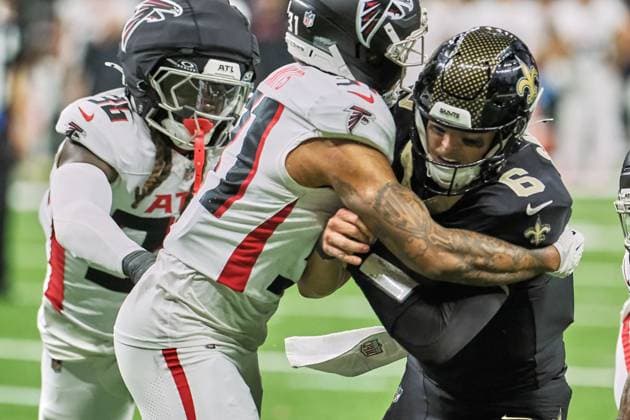 November 23, 2025, New Orleans, Louisiana, U.S: November 23, 2025, New Orleans, Louisiana, USA: (left to right) Atlanta Falcons linebacker Ronnie Harrison and Atlanta Falcons safety Xavier Watts tackles New Orleans Saints quarterback Tyler Shough during an NFL, American Football Herren, USA regular season game. The Falcons beat the Saints 10-24. New Orleans U.S - ZUMAa14_ 20251123_zaf_a14_013 Copyright: xDanxAndersonx