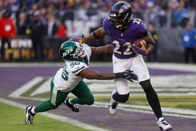 November 23, 2025: Baltimore Ravens running back Derrick Henry (22) breaks a tackle by New York Jets linebacker Quincy Williams (56) during the second half of a game at M&T Bank Stadium in Baltimore, MD. Baltimore won 23-10. Photo Mike Buscher Cal Media. Baltimore USA - ZUMAc04_ 20251123_zma_c04_403 Copyright: xMikexBuscher CalxSportxMediax