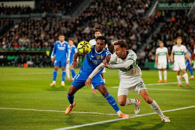 November 23, 2025, Elche, Spain: Rodrygo Silva de Goes (Real Madrid FC) and David Affengruber (Elche CF) seen in action during the LaLiga EA SPORTS game between teams of Elche CF and Real Madrid FC at Estadio Manuel Martinez Valero. Final score; Elche CF 2:2 Real Madrid FC Elche Spain - ZUMAs197 20251123_aaa_s197_218 Copyright: xMaciejxRogowskix