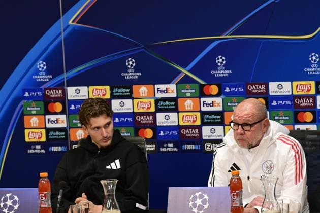 AMSTERDAM - Ajax interim manager Fred Grim, Ajax s Mika Godts during a press conference, PK, Pressekonferenz at the Johan Cruijff ArenA in Amsterdam, Netherlands, in preparation for the Champions League match against Benfica, November 24, 2025. ANP OLAF KRAAK xVIxANPxSportx xxANPxIVx 542962822 originalFilename: 542962822.jpg