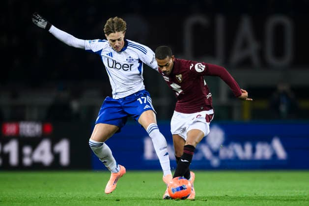 Torino FC v Como 1907 - Serie A Cyril Ngonge of Torino FC competes for the ball with Jesus Rodriguez of Como 1907 during the Serie A football match between Torino FC and Como 1907. Turin Italy Copyright: xNicolòxCampox