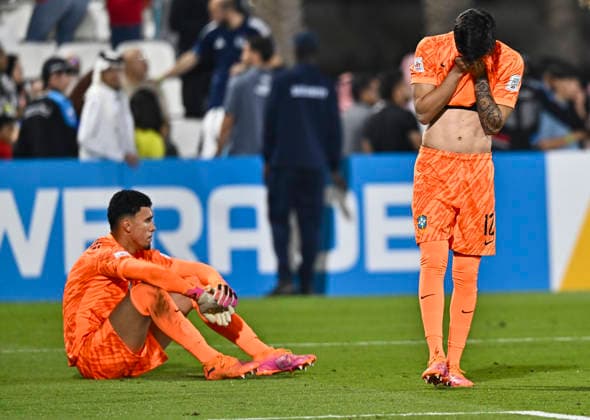 Portugal v Brazil : Semi-final- FIFA U-17 World Cup Qatar 2025 Joao Pedro and Arthur Jampa of Brazil react dejected following defeat in the penalty shootout during the FIFA U-17 World Cup Qatar 2025 Semi-final match between Portugal and Brazil in Doha, Qatar, on November 24, 2025. DOHA Qatar Copyright: xNOUSHADxTHEKKAYILx