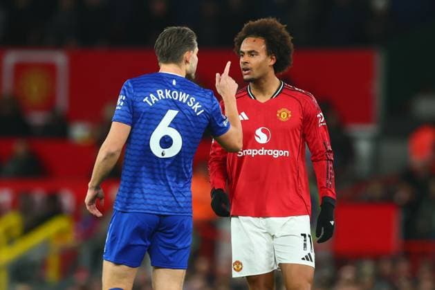 Joshua Zirkzee of Manchester United, ManU and James Tarkowski of Everton clash during the game Manchester United v Everton, Premier League, Football, Old Trafford, Manchester, UK - 24 Nov 2025Manchester Old Trafford United Kingdom EDITORIAL USE ONLY No use with unauthorised audio, video, data, fixture lists, club league logos or live services. Online in-match use limited to 120 images, no video emulation. No use in betting, games or single club league player publications.  Copyright: xPaulxCurrie Shutterstockx 15918214ba
