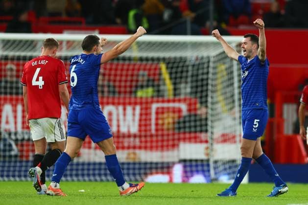 James Tarkowski of Everton and Michael Keane celebrate at full-time Manchester United, ManU v Everton, Premier League, Football, Old Trafford, Manchester, UK - 24 Nov 2025Manchester Old Trafford United Kingdom EDITORIAL USE ONLY No use with unauthorised audio, video, data, fixture lists, club league logos or live services. Online in-match use limited to 120 images, no video emulation. No use in betting, games or single club league player publications. Copyright: xPaulxCurrie Shutterstockx 15918214dr