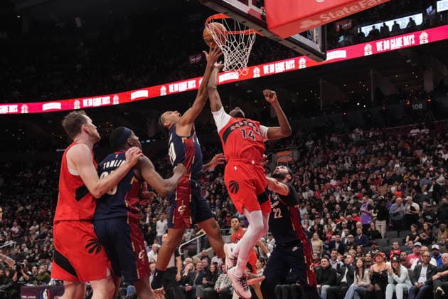 November 24, 2025, Toronto, On, CANADA: Cleveland Cavaliers guard Jaylon Tyson (20) competes for a rebound with Toronto Raptors guard Ja Kobe Walter (14) during second half NBA, Basketball Herren, USA basketball action in Toronto on Monday November 24, 2025. Jaylon Tyson; Ja Kobe Walter  - ZUMAc35_ 20251124_zaf_c35_141 Copyright: xChrisxYoungx